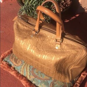 Carolina Herrera, Pre owned, Andy 10, gold, size L-XL good condition, Authentic